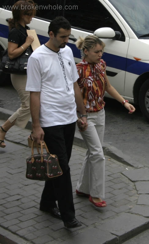 Istanbul Guy Holding Girlfriends Handbag.jpg